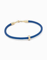 Pulsera para hombre hecha a mano con heptágono de oro y cordón azul